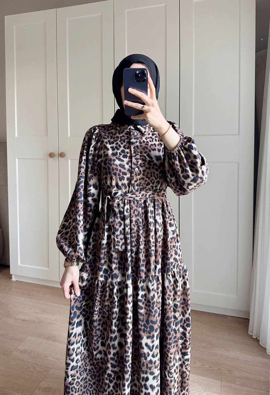 Mirror selfie with a leopard print modest dress